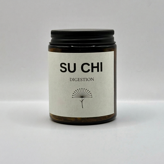 SU CHI DIGESTION tea jar on an edge-to-edge grey background